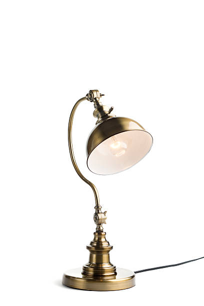 Antique brass lamp lit stock photo