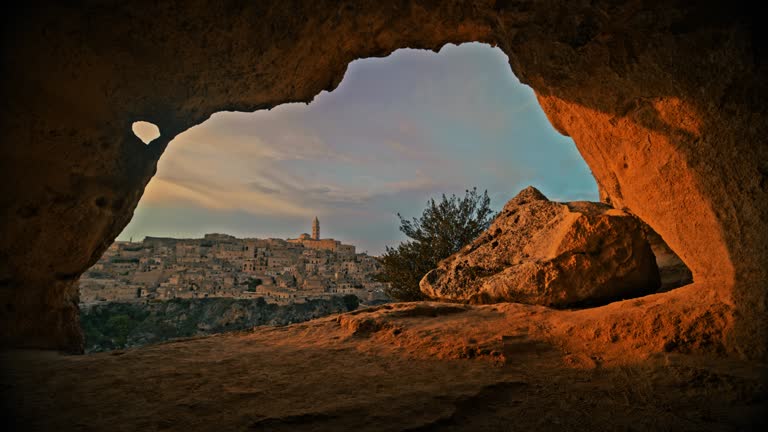 Bell tower and buildings on mountain at Sassi di Matera district. Amazing video