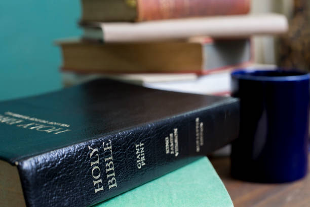 istock Stacks of Bibles and reference books for Spiritual studies. 1476791793