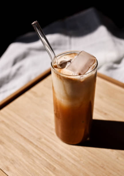 Iced dalgona coffee in a tall glass cup