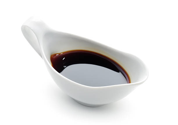 istock Porcelain boat filled with soy sauce 147679677