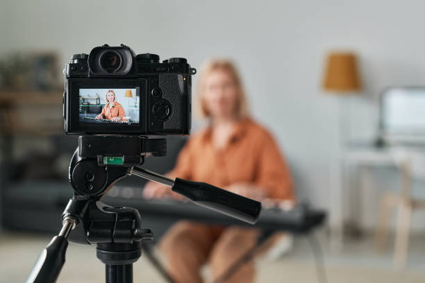 istock Woman recording musical lesson online 1476799268