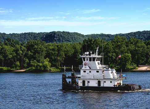 A towboat cruising on the Mississippi River in southeast Minnesota.