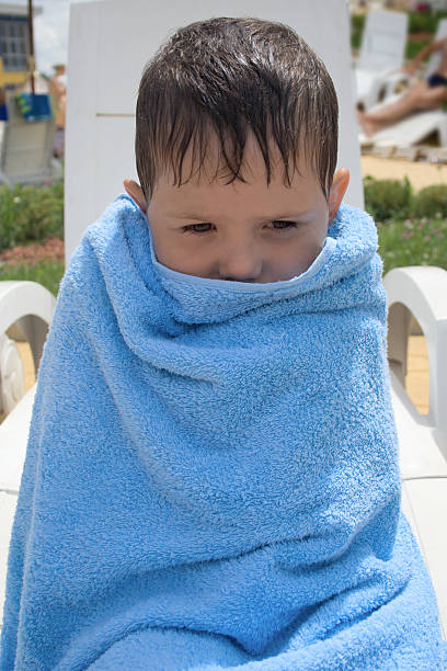 istock child wrapped in a towel 147680520