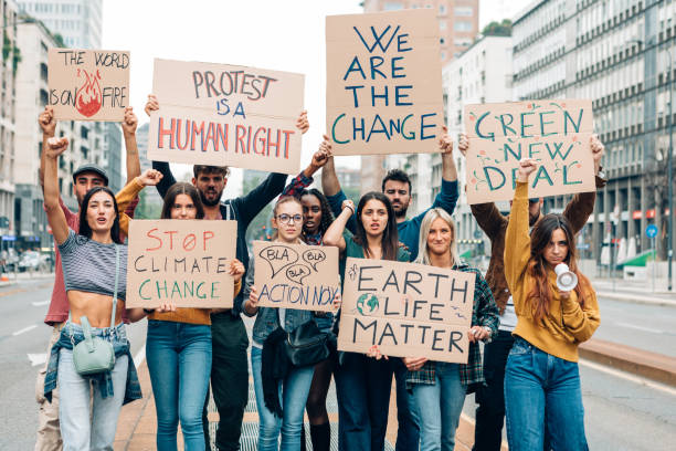 istock fridays for future protest on city street - young activists movement against global warming 1476809037