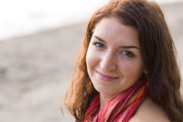 Happy brunette smiling stock photo