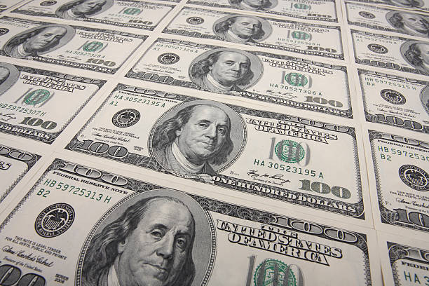 istock arrangement of100 dollar bills 147681223