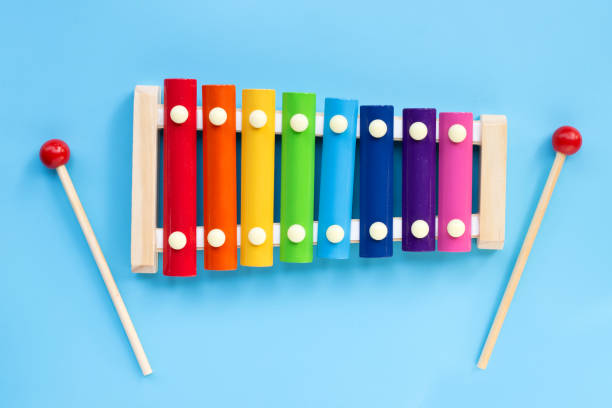 istock Colorful xylophone on blue background. 1476819887