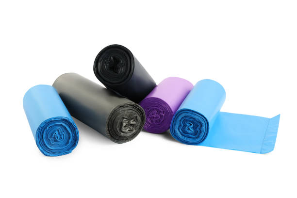 istock Rolls of different garbage bags on white background. Cleaning supplies 1476822121