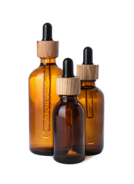 istock Different bottles of essential oil on white background 1476822203