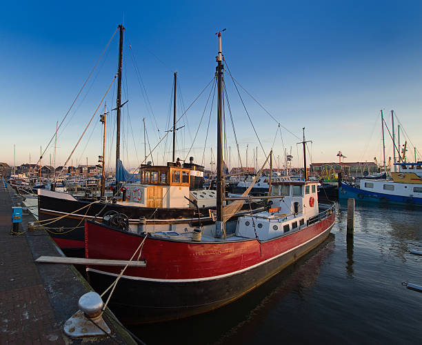 istock fishing boats in the harbor 147682948