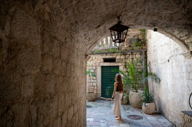 istock Woman travelling in Old Town Kotor 1476832472