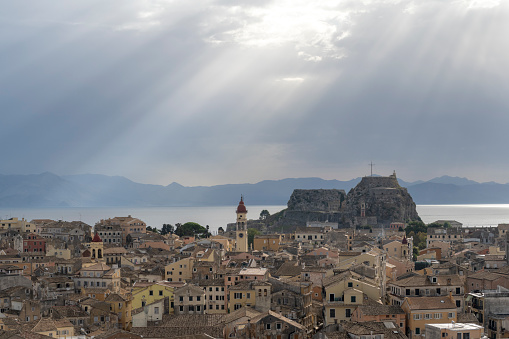 Sun rays over Old Town Corfu. Top travel destinations in the Greek Islands.