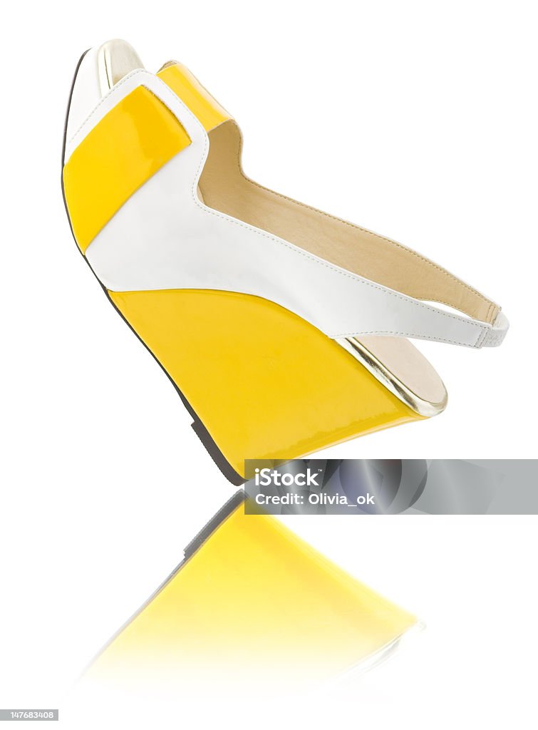 Yellow shoes Yellow shoe on white with reflrction Adult Stock Photo