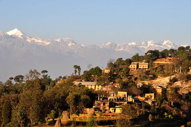 Central Himalayan Beauty A view of the central Himalayan Mountains beyond the town of Nagarkot on the rim of the Kathmandu Valley. This is the Langtang Range, and the peaks start at 20,000 feet. nagarkot photos stock pictures, royalty-free photos & images