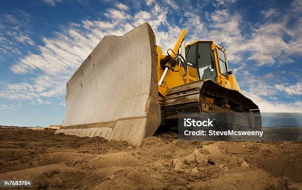 A Bulldozer Digging Up The Earth Stock Photo - Download Image Now - Bulldozer, Heavy, Machinery