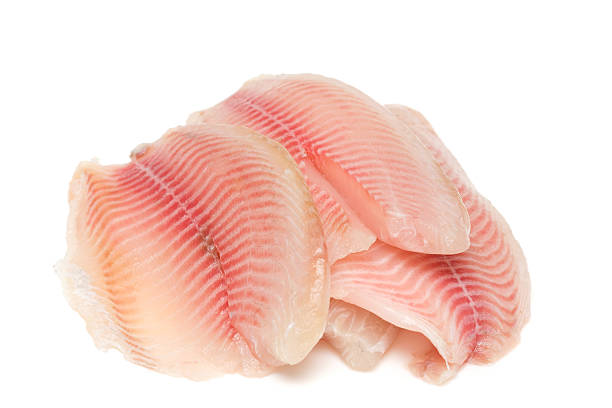 魚の切り身 - prepared fish tilapia fillet seafood ストックフォトと画像