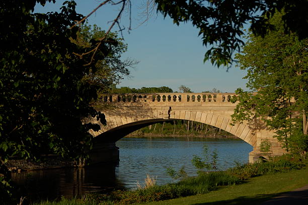 istock Bridge over park canal in Minneapolis, MN 147685012