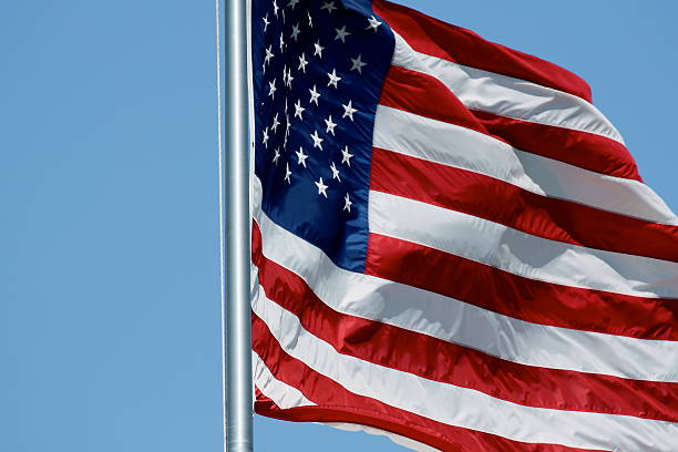 istock American Flag blowing in the wind 147685633