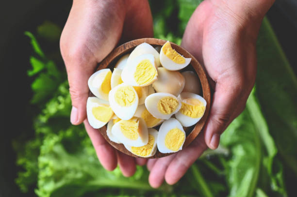 boiled eggs food, quail eggs on bowl, breakfast eggs with fresh quail eggs on hand served on the table food boiled eggs food, quail eggs on bowl, breakfast eggs with fresh quail eggs on hand served on the table food quail egg stock pictures, royalty-free photos & images