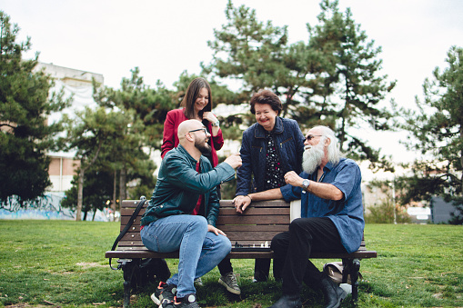 Multigenerational family sharing their moments of love in the park in Belgrade.