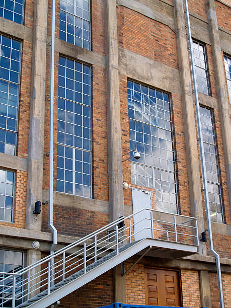 Factory building facade with windows stock photo