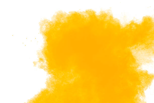istock Abstract yellow powder explosion white on  background. Yellow dust particle splashing. 1476867316