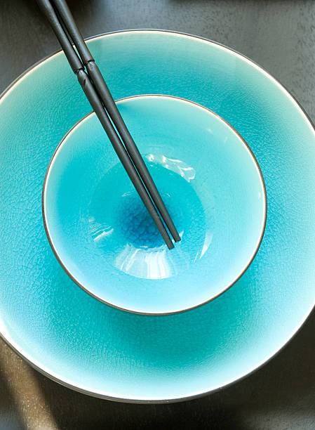 Turquoise Dishes with Chopsticks stock photo