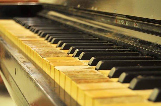 Old Dusty Piano stock photo
