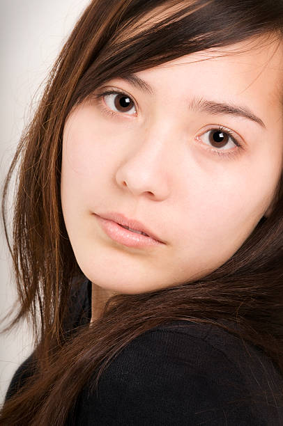 istock young woman serious 147688496