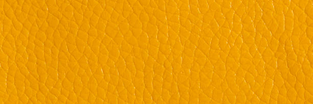 pelle gialla e sfondo strutturato, ampio banner. - car leather hide seat foto e immagini stock