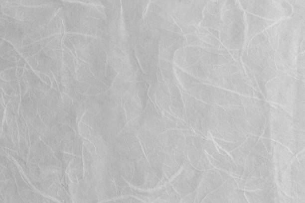 istock Mulberry paper texture background in close-up. 1476886707