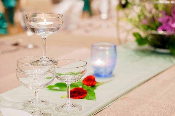 istock Elegance of glasses on table set up for dinning room 1476888432