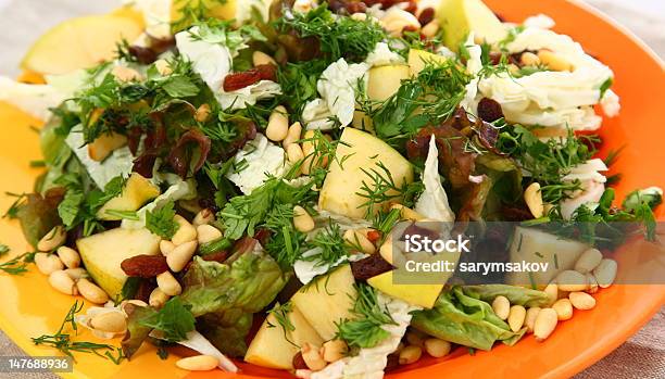 Salad With Cabbage Pine Nuts Pear And Herbs Stock Photo - Download Image Now - Cabbage, Crucifers, Dinner