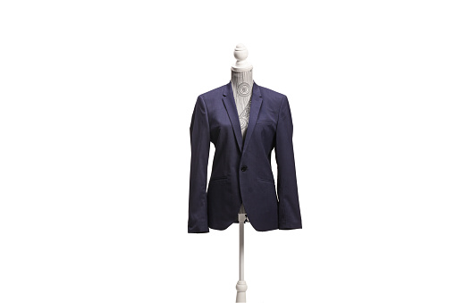 Mannequin doll with a navy blue suit isolated on white background