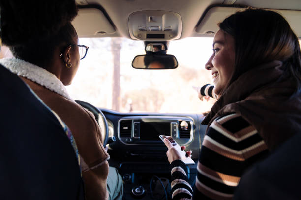 istock Interracial friends on road trip in camper van 1476895029