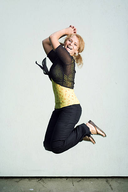 istock Happy jumping girl. 147690066