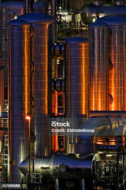 Chemical Production Facility At Night Stock Photo - Download Image Now - Aluminum, Blue, Carbon Dioxide