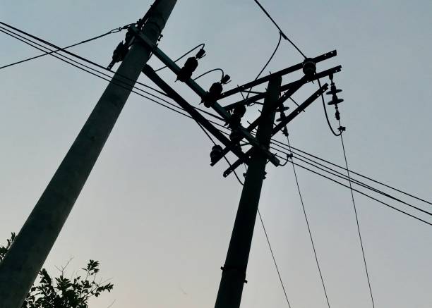 istock power towers with messy wires 1476903452