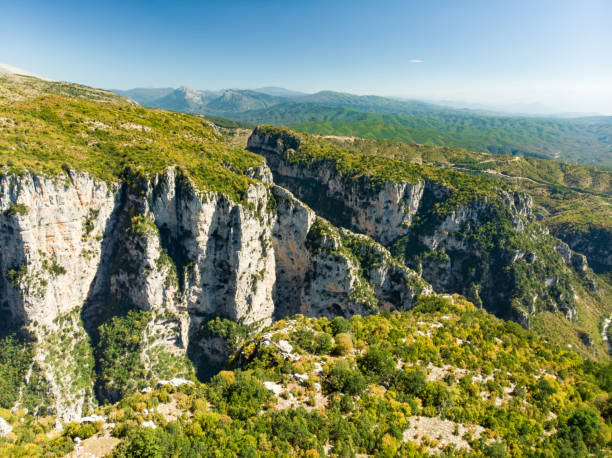 istock Stone forest, natural rock formation, created by multiple layers of stone, located near Monodendri village in Zagori region, Northern Greece. 1476908116