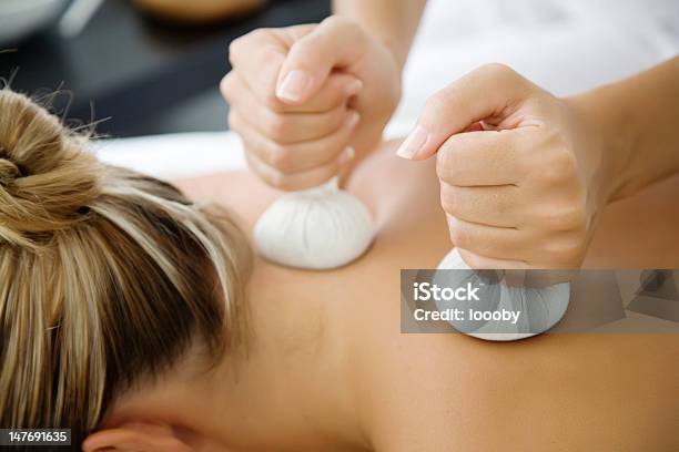 Tthai Herbal Massage Stock Photo - Download Image Now - Adult, Alternative Therapy, Beautiful Woman