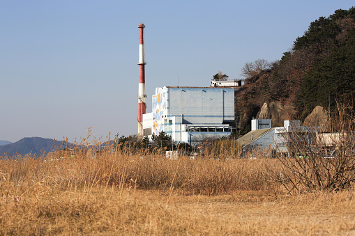 Busan, South Korea (ROK) - December 19, 2022: Dadaepo beach power plant facing the Sea of Japan.