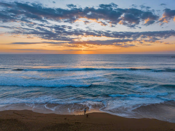 istock Sunrise at the seaside with clouds 1476927871