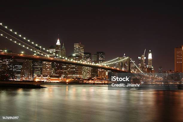 Ponte Di Brooklyn E Manhattan Skyline Notturna - Fotografie stock e altre immagini di Acqua - Acqua, Affari, Ambientazione esterna