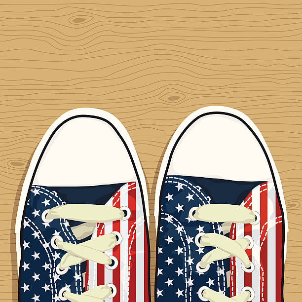 american shoes pair of shoes with american stars and stripes decoration, on wooden background, eps8 file no gradients or transparencies usa flag shoes stock illustrations