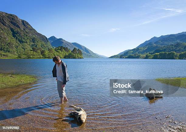 Remar Con Pala Foto de stock y más banco de imágenes de Hombres - Hombres, Escocia, Lago