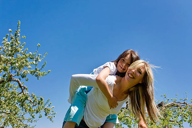 Mom and daugther having fun stock photo