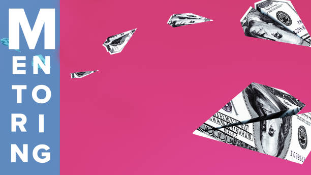 istock Mentoring concept plane shaped 100 dollar bill 1476961660