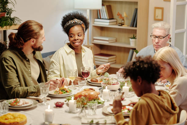 istock Happy young intercultural couple chatting by served table 1476966594