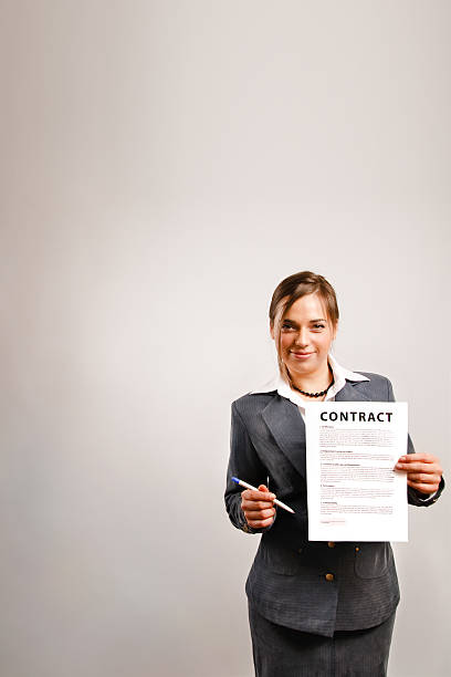 istock Businesswoman showing contract 147696833